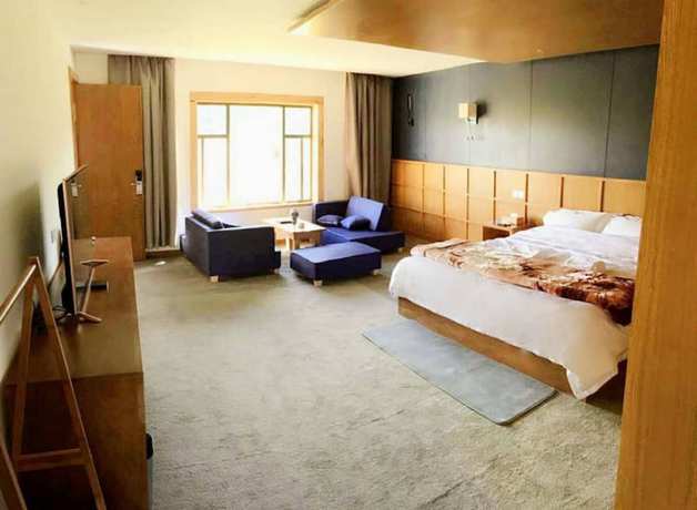 Imagen de la habitación del Hotel Shangri-la Youyou Inn. Foto 18