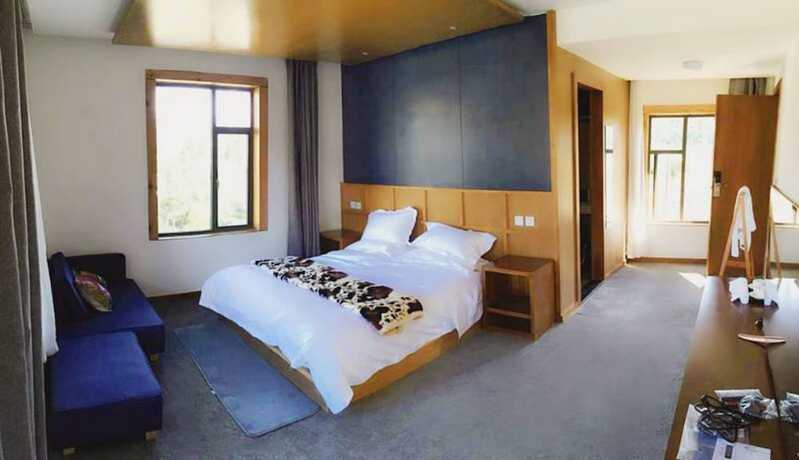 Imagen de la habitación del Hotel Shangri-la Youyou Inn. Foto 20