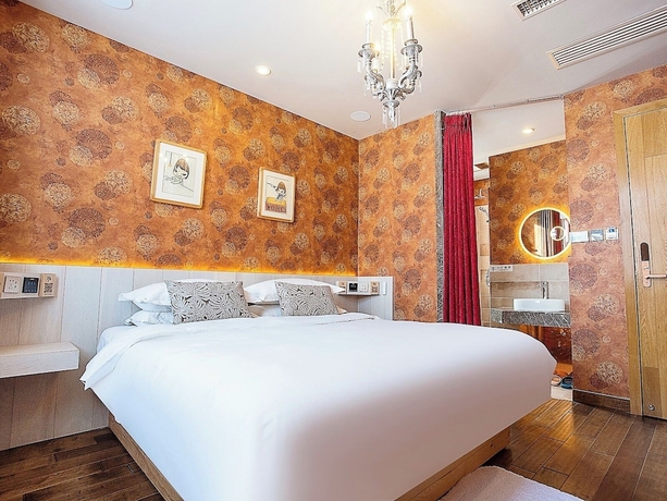 Imagen de la habitación del Hotel Shangzhi Qushe Resort. Foto 5