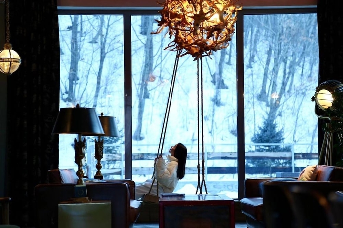 Imagen de los interiores del Hotel Shangzhi Qushe Resort. Foto 14