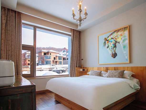 Imagen de la habitación del Hotel Shangzhi Qushe Resort. Foto 12