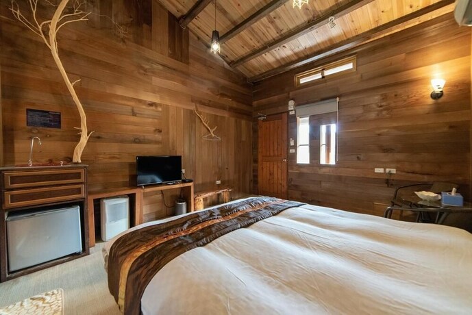 Imagen de la habitación del Hotel Shankou Hotspring. Foto 18