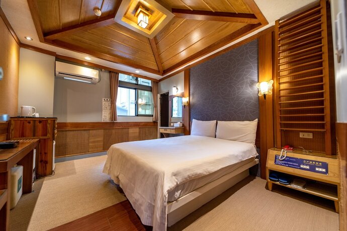 Imagen de la habitación del Hotel Shankou Hotspring. Foto 19