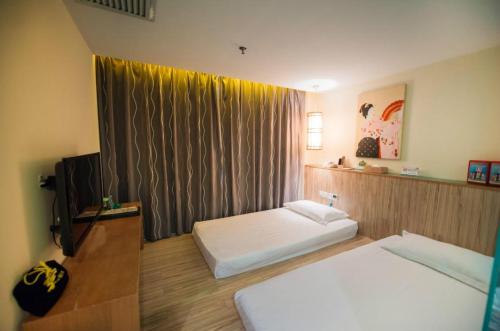 Imagen general del Hotel Shanshui Fashion Xijiang Road. Foto 2