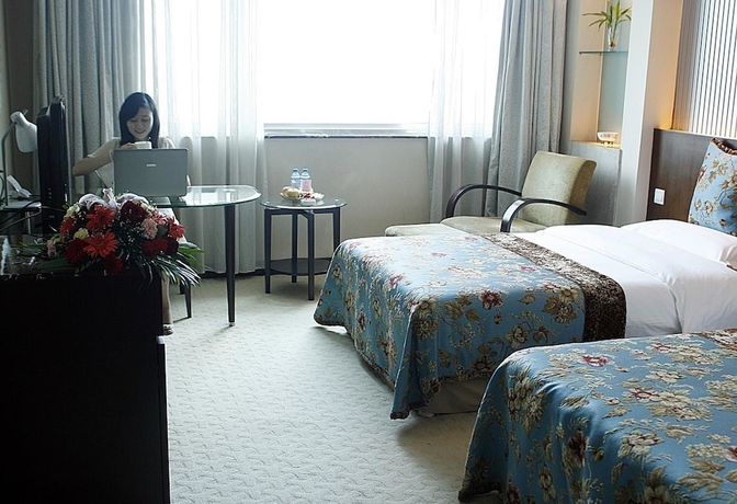 Imagen de la habitación del Hotel Shanshui Hotel. Foto 3