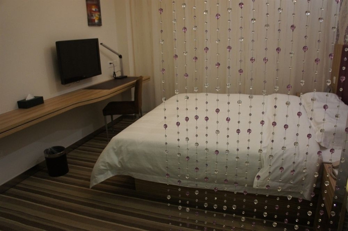 Imagen de la habitación del Hotel Shanshui Trend. Foto 4