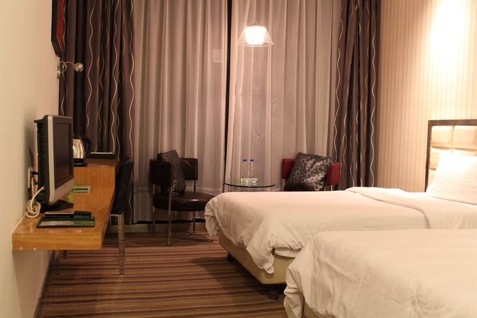 Imagen de la habitación del Hotel Shanshui Trends East Railway Station Guangzhou. Foto 3