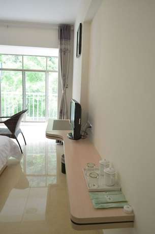 Imagen de la habitación del Hotel Shanshui Trends Hotel Bama Bipoyuan. Foto 3