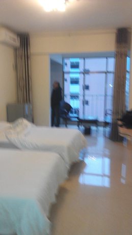 Imagen de la habitación del Hotel Shanshui Trends Hotel Bama Bipoyuan. Foto 13