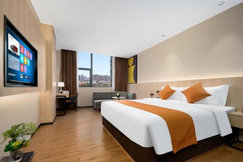 Imagen de la habitación del Hotel Shanshui Trends - Shatian Metro Station Longguang City. Foto 19