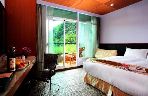 Imagen de la habitación del Hotel Shante Shitou. Foto 8