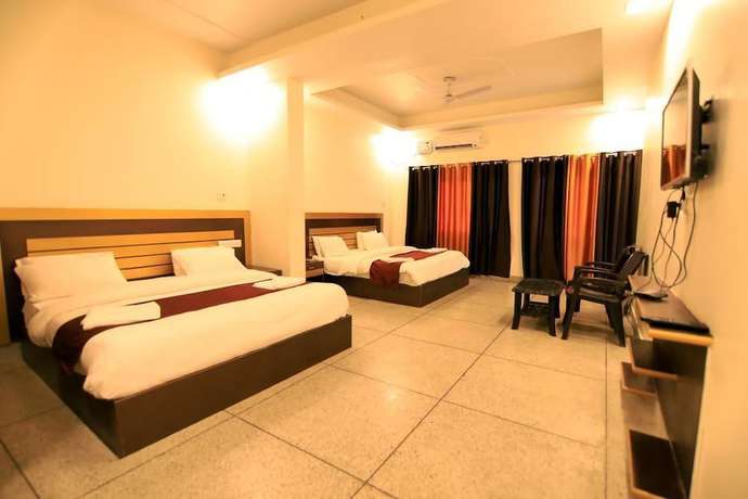 Imagen de la habitación del Hotel Shanti Residency Ganga View. Foto 11