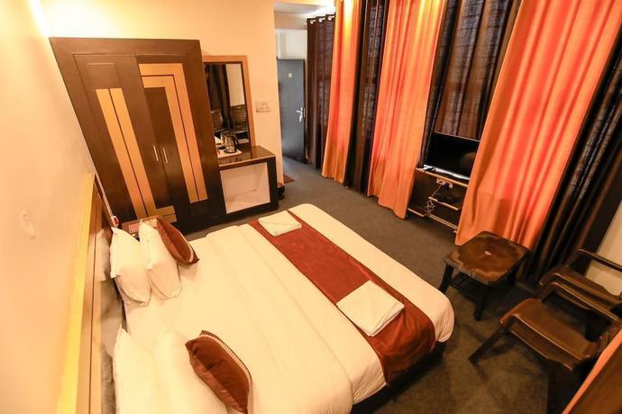 Imagen de la habitación del Hotel Shanti Residency Ganga View. Foto 14