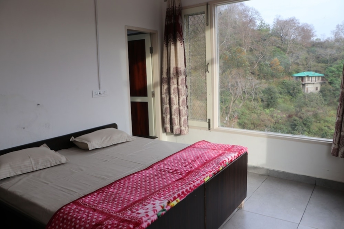 Imagen de la habitación del Hotel ShantiKunj Homestay Nearby Morni Hills Waterfall. Foto 2