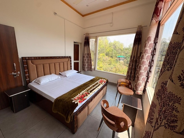 Imagen de la habitación del Hotel ShantiKunj Homestay Nearby Morni Hills Waterfall. Foto 7