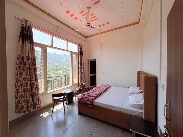 Imagen de la habitación del Hotel ShantiKunj Homestay Nearby Morni Hills Waterfall. Foto 8