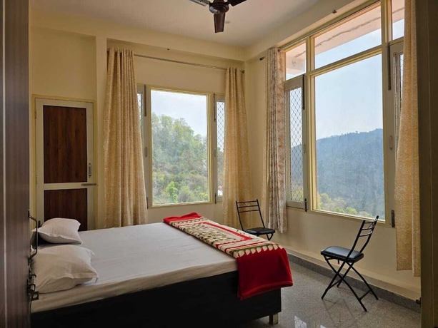 Imagen de la habitación del Hotel ShantiKunj Homestay Nearby Morni Hills Waterfall. Foto 9