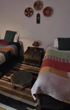 Imagen de la habitación del Hotel Shantidevi ashram s guesthouse. Foto 6