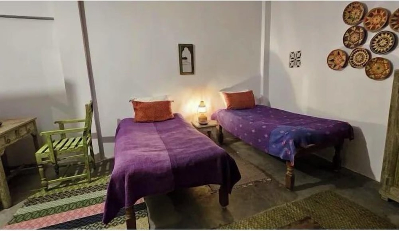 Imagen de la habitación del Hotel Shantidevi ashram s guesthouse. Foto 7