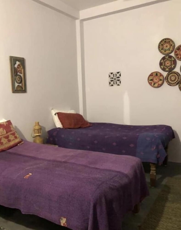 Imagen de la habitación del Hotel Shantidevi ashram s guesthouse. Foto 8