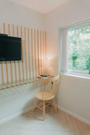 Imagen de la habitación del Hotel Shanti-retreat. Foto 23