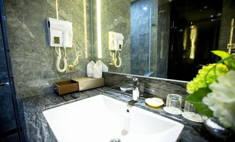 Imagen de la habitación del Hotel Shantou Grandtide Hotel. Foto 7