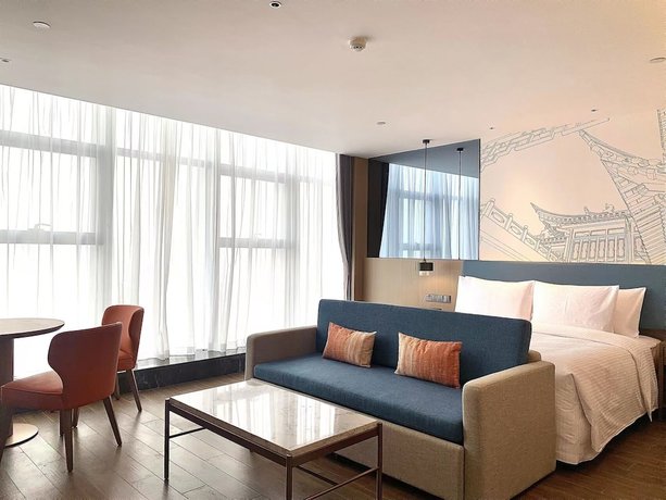Imagen de la habitación del Hotel Shanxi Xiaohe Xincheng Talent Apartment. Foto 5