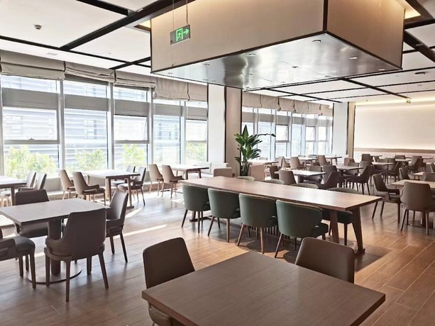 Imagen del bar/restaurante del Hotel Shanxi Xiaohe Xincheng Talent Apartment. Foto 3