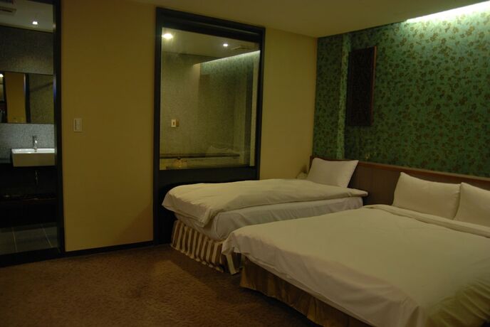 Imagen de la habitación del Hotel Shan-yue Hotspring. Foto 11