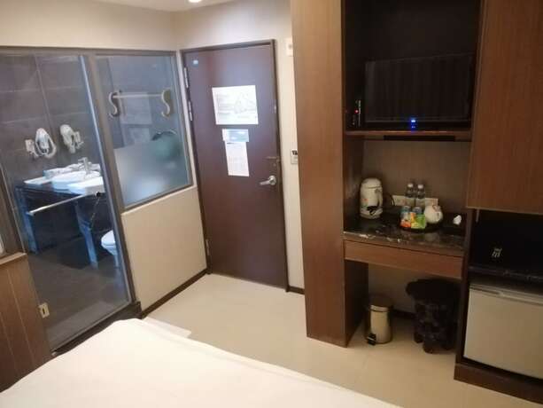 Imagen de la habitación del Hotel Shan-yue Hotspring. Foto 12