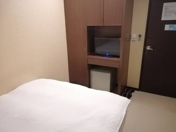 Imagen de la habitación del Hotel Shan-yue Hotspring. Foto 13
