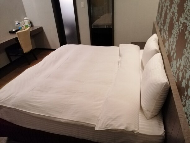 Imagen de la habitación del Hotel Shan-yue Hotspring. Foto 15