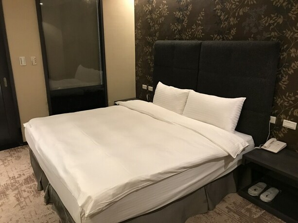 Imagen de la habitación del Hotel Shan-yue Hotspring. Foto 16