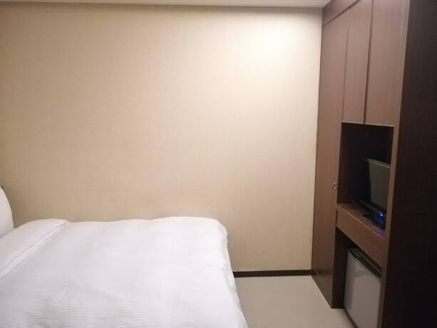 Imagen de la habitación del Hotel Shan-yue Hotspring. Foto 20