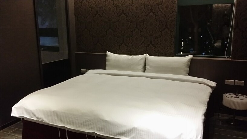 Imagen de la habitación del Hotel Shan-yue Hotspring. Foto 21