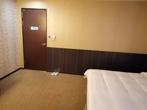 Imagen de la habitación del Hotel Shan-yue Hotspring. Foto 23