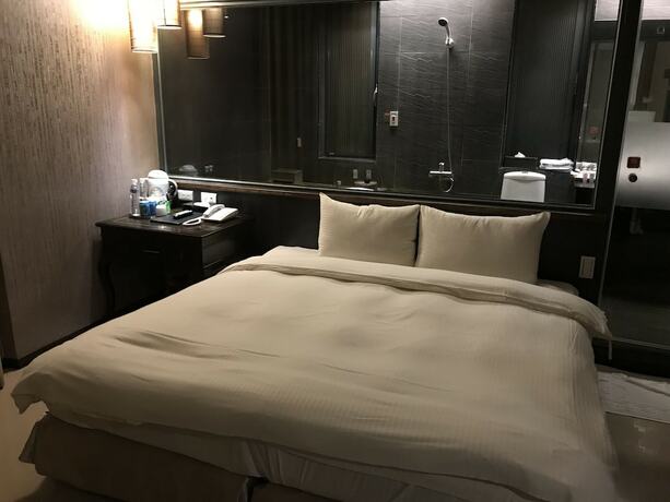 Imagen de la habitación del Hotel Shan-yue Hotspring. Foto 24