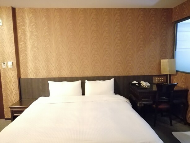 Imagen de la habitación del Hotel Shan-yue Hotspring. Foto 25