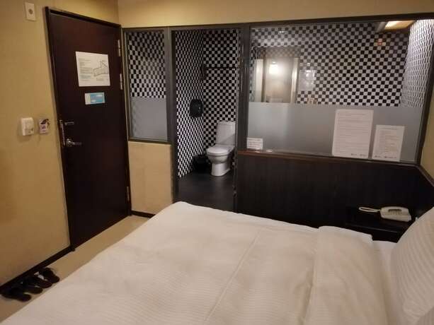 Imagen de la habitación del Hotel Shan-yue Hotspring. Foto 26