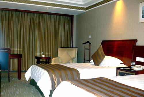 Imagen de la habitación del Hotel Shao Xing International. Foto 6
