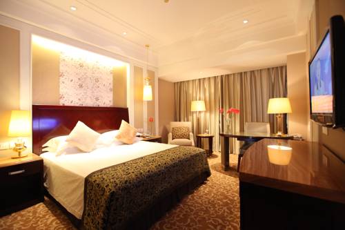 Imagen de la habitación del Hotel Shao Xing International. Foto 9