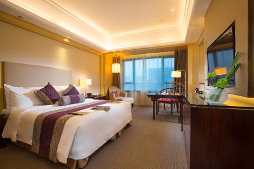Imagen de la habitación del Hotel Shaoxing Tianma Grand. Foto 2