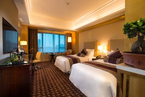 Imagen de la habitación del Hotel Shaoxing Tianma Grand. Foto 3