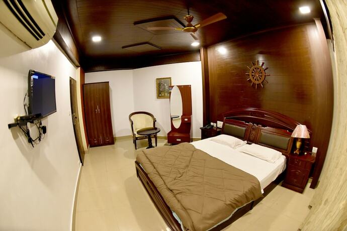 Imagen de la habitación del Hotel Sharada International. Foto 13
