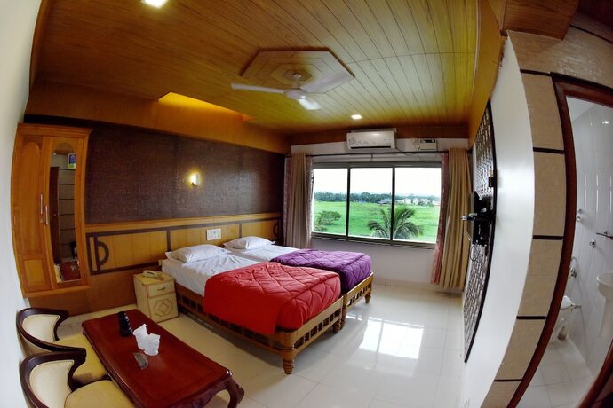 Imagen de la habitación del Hotel Sharada International. Foto 14
