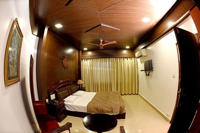 Imagen de la habitación del Hotel Sharada International. Foto 15