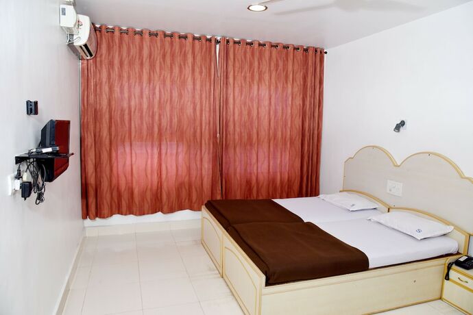 Imagen de la habitación del Hotel Sharada International. Foto 16