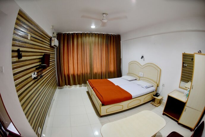 Imagen de la habitación del Hotel Sharada International. Foto 17