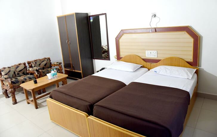 Imagen de la habitación del Hotel Sharada International. Foto 18