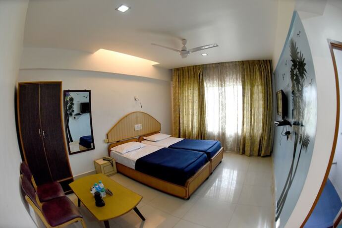 Imagen de la habitación del Hotel Sharada International. Foto 20